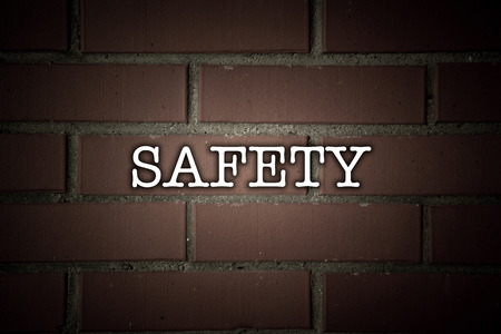 texture of the walls of brown bricks with titleの写真素材