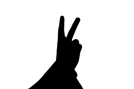 male hand showing two fingers black on a whiteの写真素材