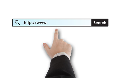 man's hand clicks on the address bar closeupの写真素材
