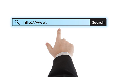 man's hand clicks on the address bar closeupの写真素材