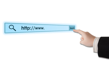 man's hand clicks on the address bar closeupの写真素材