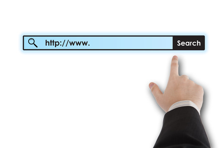 man's hand clicks on the address bar closeupの写真素材