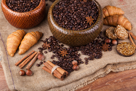 roasted coffee beans in a bamboo basket still lifeの写真素材