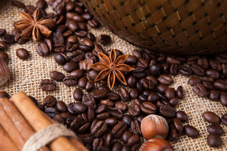 roasted coffee beans and star anise close up still lifeの写真素材