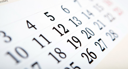 white calendar days with numbers close upの写真素材