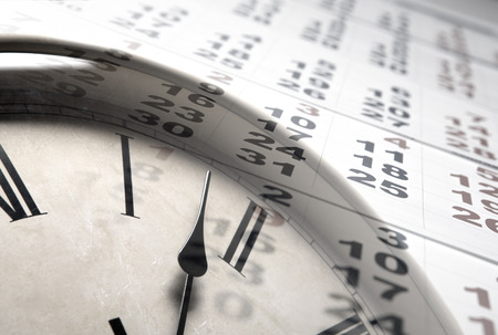 sheet of a calendar with the number of days and clockの写真素材