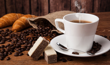 Coffee still life with cup of coffee with wood backgroundの写真素材