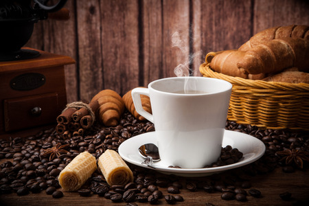 Coffee still life with cup of coffee with wood backgroundの写真素材