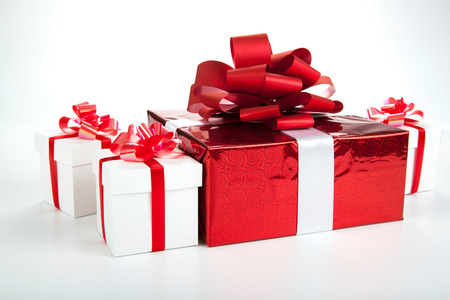 one red gift box white gift boxes on gray on grayの写真素材