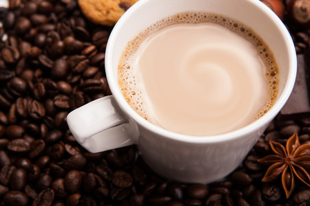 coffee beans coffee with cream in a cup still lifeの写真素材