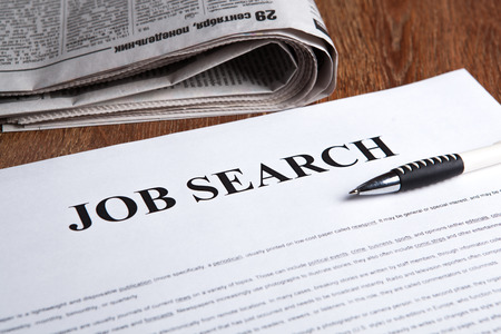 document with the title of job search with newspaper closeupの写真素材
