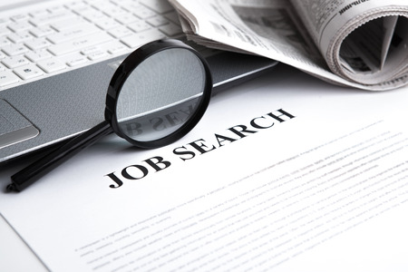 document with the title of job search with newspaper closeupの写真素材