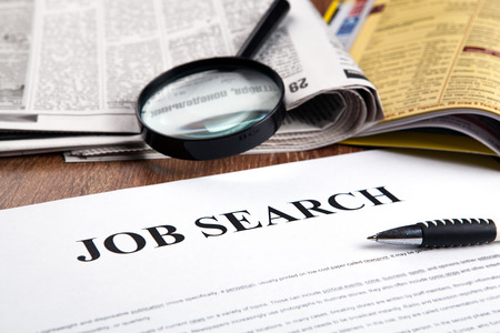 document with the title of job search with newspaper closeupの写真素材