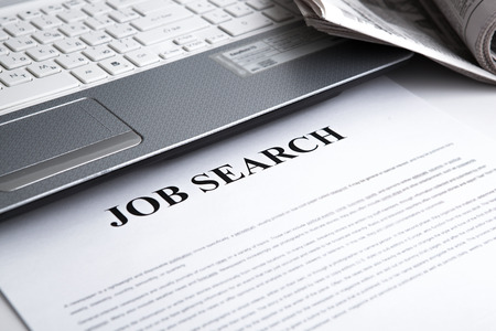 document with the title of job search with newspaper closeupの写真素材