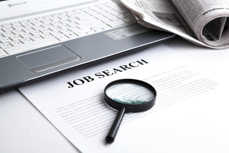 document with the title of job search with newspaper closeupの写真素材