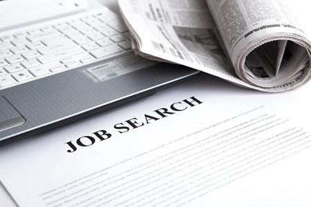 document with the title of job search with newspaper closeupの写真素材