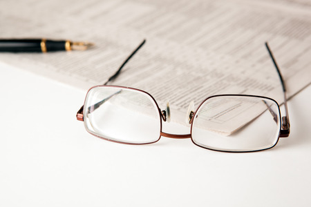 business still life with fountain pen and glassesの写真素材