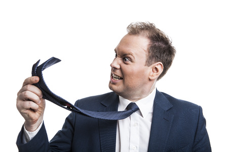 man mad at himself on a white backgroundの写真素材