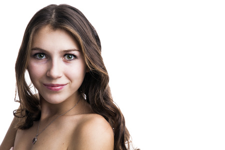 portrait of a charming young girl on a white backgroundの写真素材