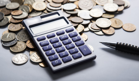 handful of Russian rubles with calculator close upの写真素材