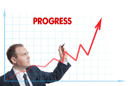 businessman drawing chart with text isolatedの写真素材