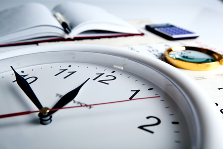 business stil life with clockface close upの写真素材
