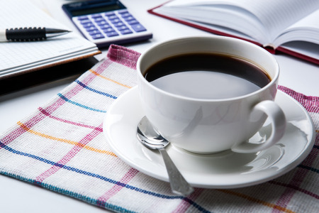 cup of black coffee, office supplies, close upの写真素材