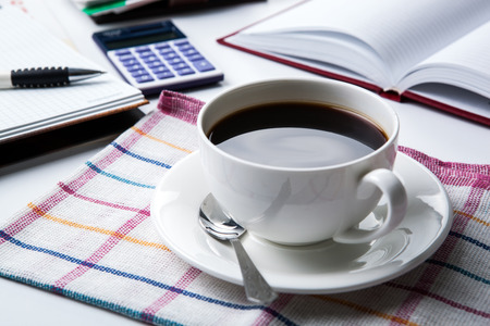 cup of black coffee, office supplies, close upの写真素材