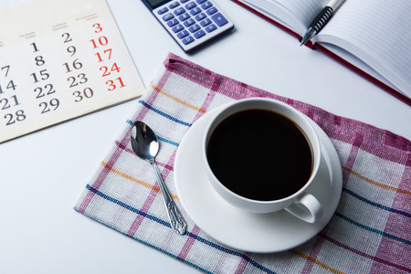 cup of black coffee, office supplies, close upの写真素材