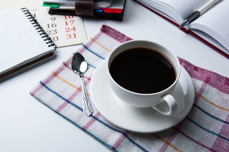 cup of black coffee, office supplies, close upの写真素材