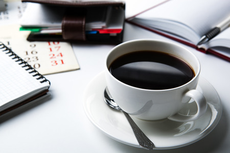 cup of black coffee, office supplies, close upの写真素材
