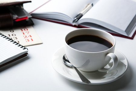 cup of black coffee, office supplies, close upの写真素材