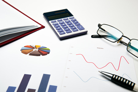 Business still life with chart and office suppliesの写真素材