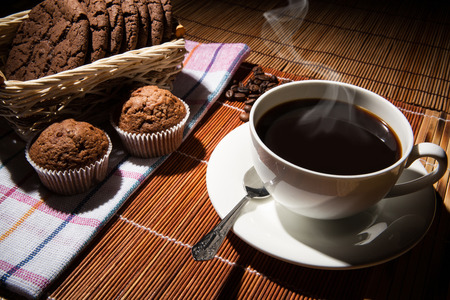 cup of black coffee and cookiesの写真素材