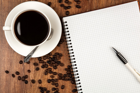 business still-life with cup of coffee and notepadの写真素材