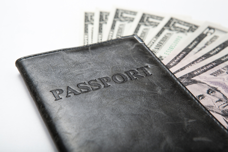 passport with dollar billsの写真素材
