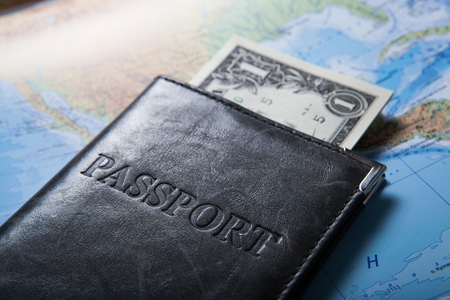 passport with dollar billsの写真素材