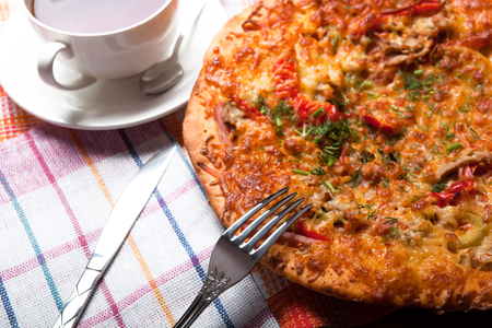 breakfast pizza and tea close upの写真素材