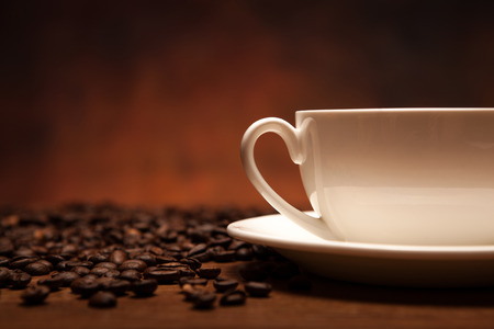 cup of coffee on a coffee backgroundの写真素材