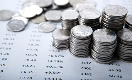 pile of coins and counting close upの写真素材