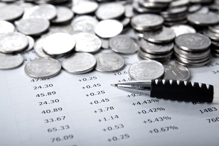 pile of coins and counting close upの写真素材