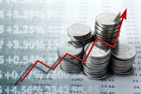 pile of coins with digits and counting close upの写真素材