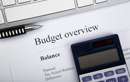 document with title budget overview and keyboard, calculator close upの写真素材