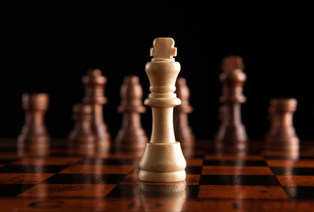 chess pieces with the king in the centerの写真素材