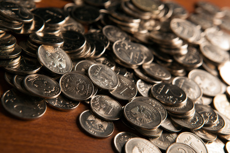 bunch of Russian rubles coins on a wooden surface close upの写真素材