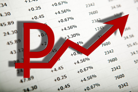table with numbers printed on paper and ruble symbol close upの写真素材