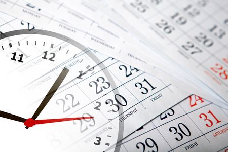 wall calendar calendar with the number of days and clock close upの写真素材