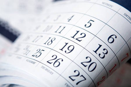 pile of wall calendar sheets close upの写真素材