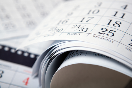 pile of wall calendar sheets close upの写真素材