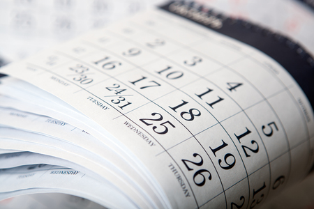 pile of wall calendar sheets close upの写真素材